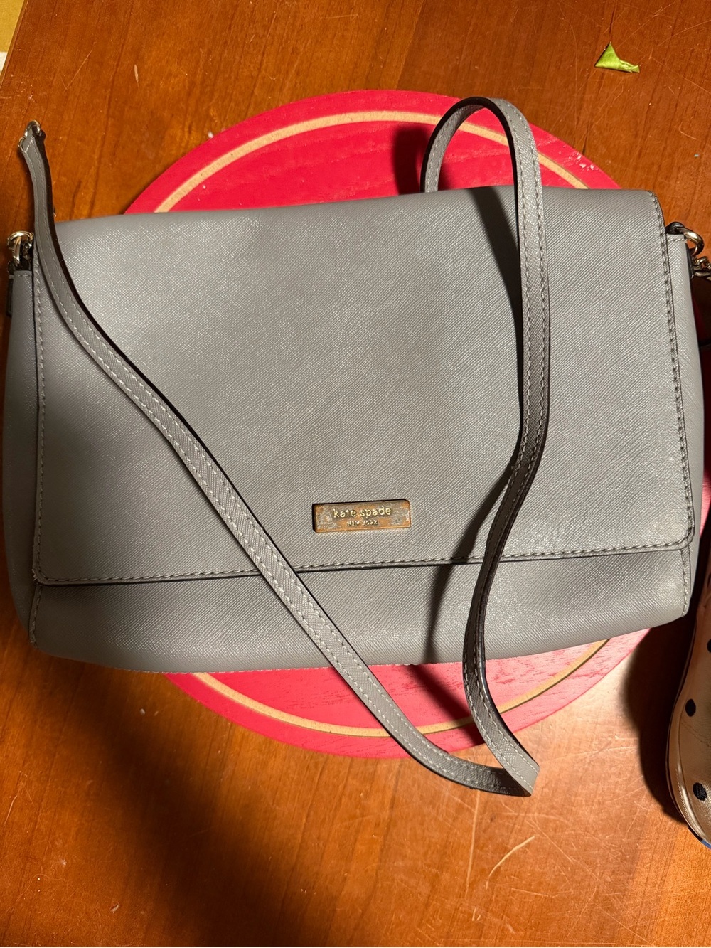 kate spade gray saffiano crossbody bag with gold plaque